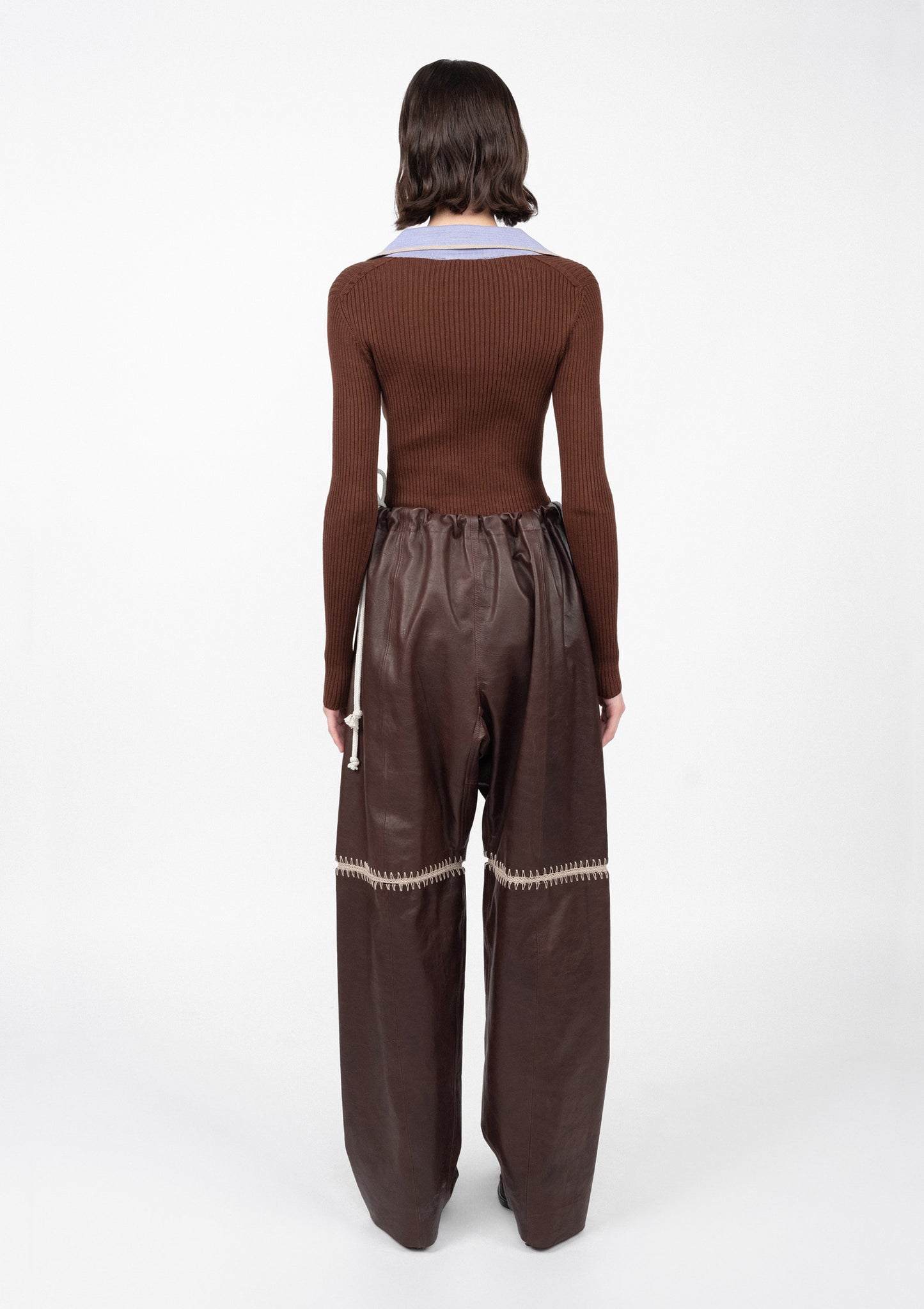 LEATHER CROCHET PANTS
